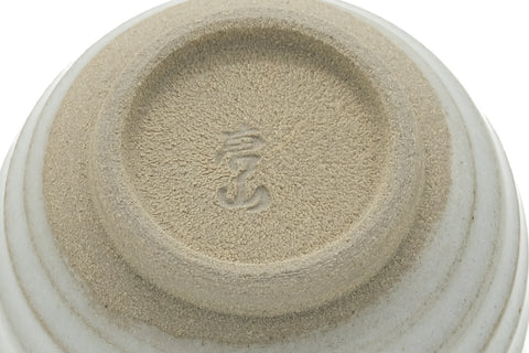 Tezumi — Japanese Teacup - Simple Spiraling Beige Yunomi - 100ml — inverted showing the foot ring