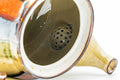 Japanese Kyusu - Beige Colourfully Striped Ceramic Filter Teapot - 400ml - closeup of the interior with the lid off, showing the built-in ceramic mesh filter at the spout