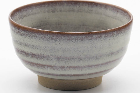 Tezumi — Japanese Teacup - Grey Milky Glazed Spiraling Yunomi - 130ml — tipped to show the interior