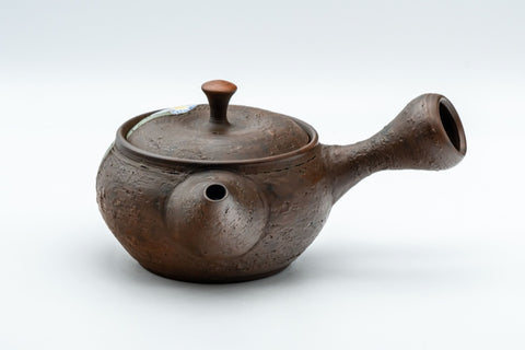 The artisan teapot from another angle, handle to the right and spout forward.