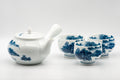 Japanese Tea Set - Hataman Toen Arita-yaki Porcelain Debeso Kyusu with 3 Wan-nari Yunomi - 420ml - side view of the kyusu teapot with side handle and painted landscape