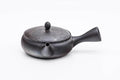 Mogake Seaweed Yōhen flat Tokoname teapot in dark kokudei clay with side handle, three-quarter view with the spout to the left and lid on