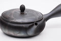 Mogake Seaweed Yōhen flat Tokoname teapot, three-quarter view of the flat body with the lid on and the spout to the left