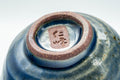 Japanese Teacup - Wabi-Sabi Blue-Green Undulating Yunomi - 110ml - closeup of the underside showing the unglazed foot ring and inscribed base mark