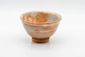 Japanese Teacup - 萩焼 Gohonte Wan-nari Hagi-yaki Yunomi - 140ml - three-quarter view showing the peach gohon speckled glaze
