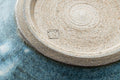 Close-up of the unglazed base showing concentric throwing rings.