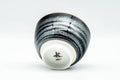 Japanese Teacup - Wavy Tenmoku Glazed Guinomi - 50ml - underside view showing the white footring and maker's mark