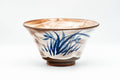 Japanese Matcha Bowl - Blue Grass White Hakeme Chawan - 250ml - front view showing the blue grass design and flared rim