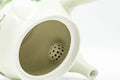 Japanese Kyusu - Beige Green Striped Snow Peas Kutani-yaki Debeso Teapot - 400ml - interior view showing the mesh strainer at the spout