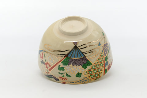 Underside of the chawan showing the foot ring and pattern near the base.