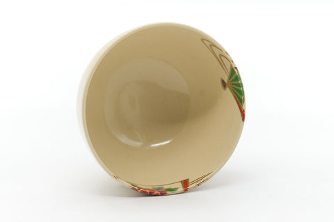 Overhead three-quarter view showing the plain cream interior of the bowl.