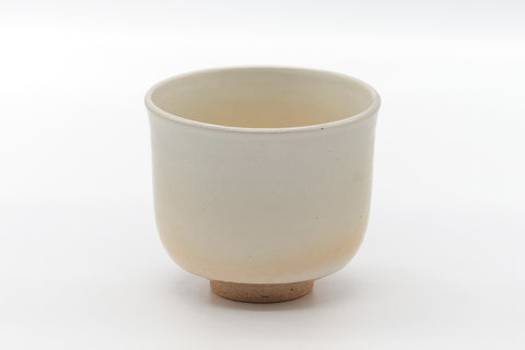 Side view of the matcha bowl showing the plainer beige glaze.