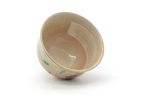 Floral cream chawan seen from above, looking into the cream-glazed interior