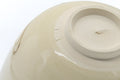 Close-up of the underside and foot ring on the unglazed base.
