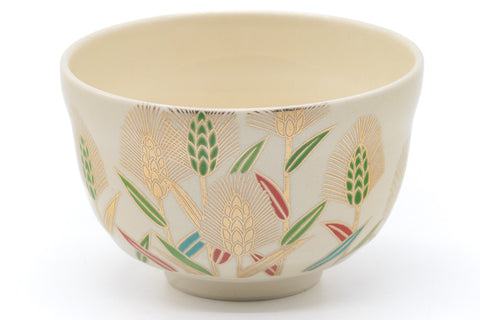 Angled view into the bowl interior with the wheat-motif decoration around the rim.