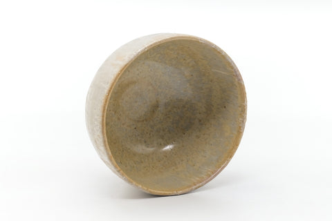 Overhead view into the bowl showing the pale glazed interior.