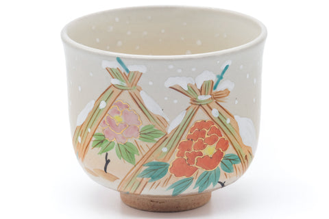 Front view highlighting the hand-painted floral wintery motif in orange and green.