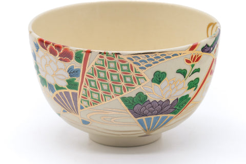 Side view showing the geometric floral motif wrapping around the bowl.