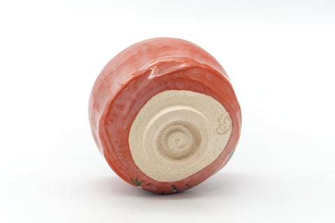 Underside of the chawan showing the cream foot ring and base.