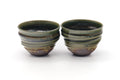 Tezumi — Japanese Teacups - Pair of Ash Green Glazed Spiraling Yunomi — three-quarter view