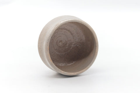 Overhead view into the bowl showing the cream interior with a faint pink blush.
