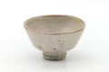 Front view of the ido-shaped Hagi chawan showing its soft glaze.