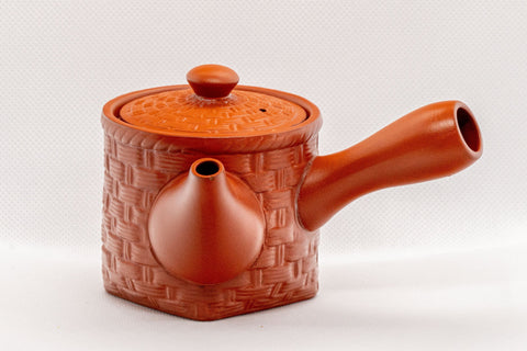 Japanese Kyusu - Small Basket-patterned Tokoname-yaki Ceramic Teapot - 165ml - three-quarter front view showing the basket-weave surface texture and side handle