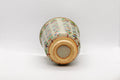 Tezumi — Japanese Teacup - Shibukusa-yaki Tsutsu-gata Yunomi - 135ml — tipped to show the interior