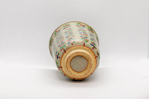 Tezumi — Japanese Teacup - Shibukusa-yaki Tsutsu-gata Yunomi - 135ml — tipped to show the interior