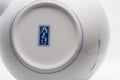 Tezumi — Japanese Kyusu - White Arita-yaki Porcelain Teapot with Blue Orchid decorations - 475ml — closeup of the base