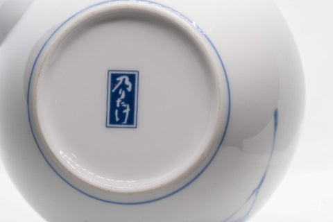 Tezumi — Japanese Kyusu - White Arita-yaki Porcelain Teapot with Blue Orchid decorations - 475ml — closeup of the base