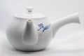 Tezumi — Japanese Kyusu - White Arita-yaki Porcelain Teapot with Blue Orchid decorations - 475ml — side view with the lid and side handle