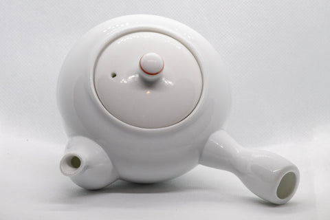 Tezumi — Japanese Kyusu - Persimmon Porcelain Arita-yaki Debeso Teapot - 315ml — three-quarter view from the opposite side