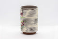 Tezumi — Japanese Teacup - Brushed white glaze tsutsu-gata yunomi with floral design - 150ml — front view from another angle
