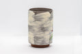 Tezumi — Japanese Teacup - Brushed white glaze tsutsu-gata yunomi with floral design - 150ml — three-quarter view