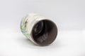 Tezumi — Japanese Teacup - Brushed white glaze tsutsu-gata yunomi with floral design - 150ml — top-down view of the interior