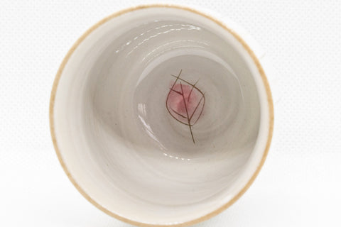 Tezumi — Japanese Teacup - 夭窯 Striped White Yunomi - 150ml — tipped to show the interior