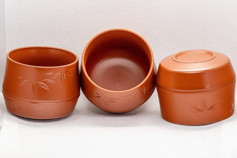 Japanese Teacups - Set of 3 Bamboo Tokoname-yaki Yunomi - 110ml - one cup tipped on its side showing the interior beside the others