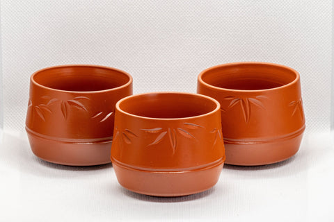Japanese Teacups - Set of 3 Bamboo Tokoname-yaki Yunomi - 110ml - front view of the three brick-red bamboo-shaped Tokoname-yaki cups