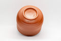 Japanese Teacup - Spiral Tokoname-yaki Yunomi - 135ml - tilted view showing the foot and underside