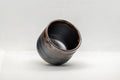 Japanese Teacup - Tenmoku Glazed Tsutsu-gata Yunomi - 65ml - tilted view showing the glazed interior
