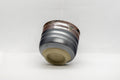 Japanese Teacup - Tenmoku Glazed Tsutsu-gata Yunomi - 65ml - the cup on its side showing the base