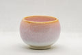 Japanese Teacups - Set of 5 Sakura Nagashi Wa-nari Guinomi - closeup of a single cup showing the peach and pink glazed interior