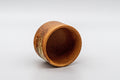 Japanese Teacup - Orange Glazed Hantsutsu-gata Guinomi - 45ml - tilted view showing the interior and base