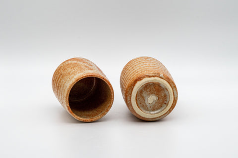 Japanese Teacups - Pair of Shino Glazed Tsutsu-gata Yunomi - 90ml - the pair resting on their sides showing the undersides