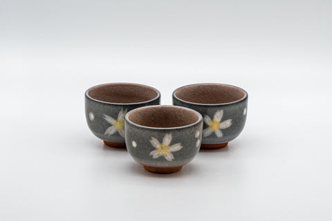 Japanese Teacups - Set of 3 Floral Snowflake Glazed Guinomi - 45ml - the three guinomi arranged in a row, front view