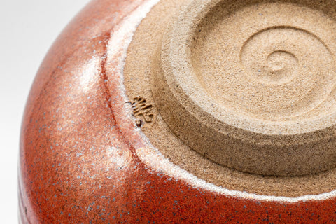 Japanese Matcha Bowl Set - Tanaka Kayama Ochre Glazed Hantsutsu-gata Chawan with Bamboo Chasen Whisk and Chashaku Scoop - 450ml - top-down view into the bowl showing the spiral base and unglazed footring