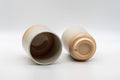 Tezumi — Japanese Teacups - Couple's Pair of Tsutsu-gata Hagi-yaki Meoto Yunomi — tipped to show the interior