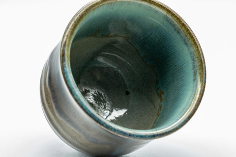 Japanese Teacups - Set of 3 Olive Green Turquoise Koishiwara-yaki Yunomi - 100ml - a single teacup tilted to show the turquoise glazed interior