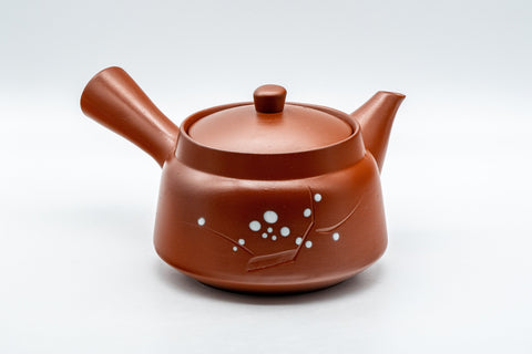 Tezumi — Japanese Tea Set - Plum Blossoms Tokoname-yaki Debeso Kyusu, Kashiki, and 5 Yunomi — the teapot in three-quarter view